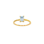 An 18kt yellow gold ring with step cut natural aquamarine
