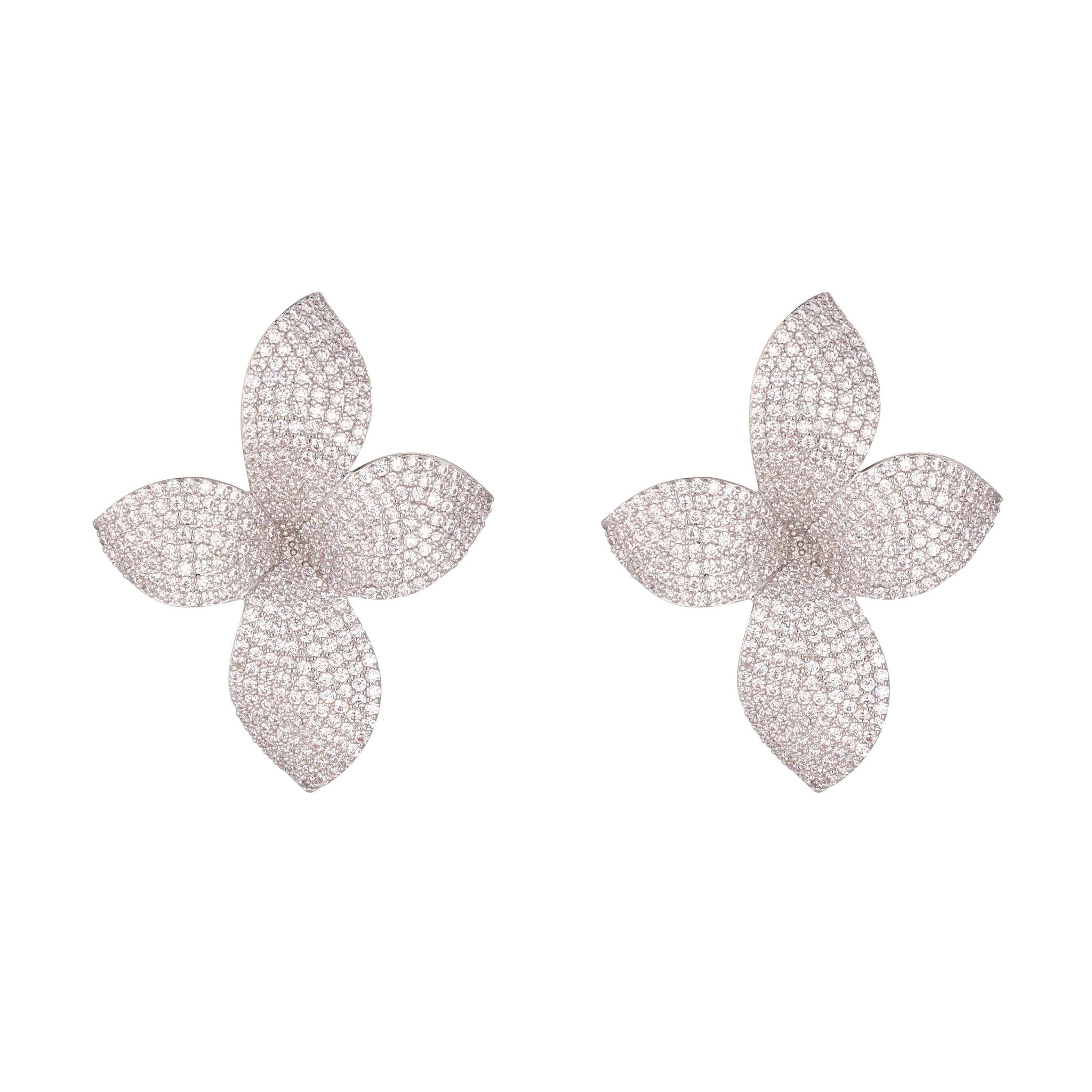 A pair of white willow stud earrings with a rhodium-plated base and Cubic Zirconia stones.