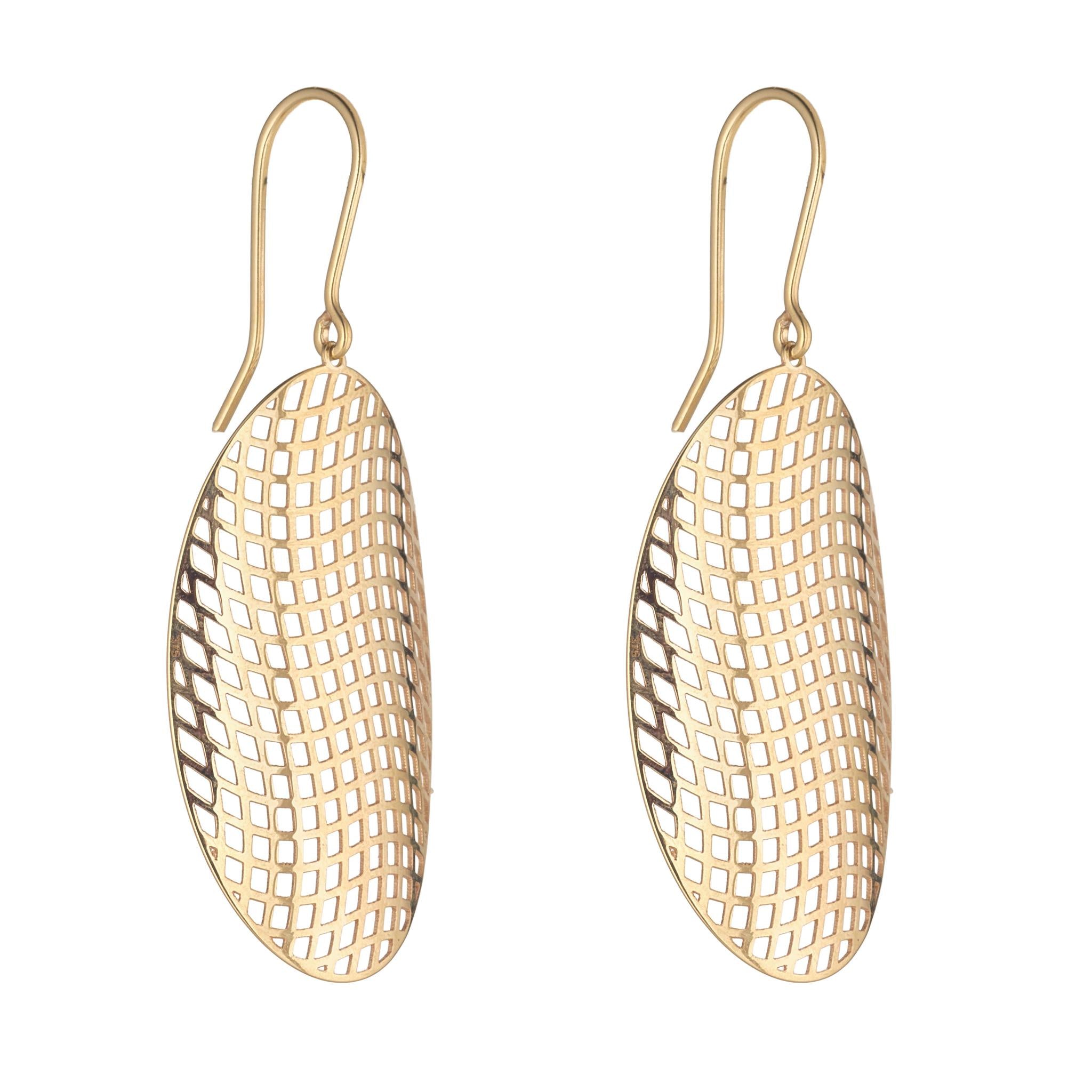 Gold earrings with a textured, grid-like design on a white background