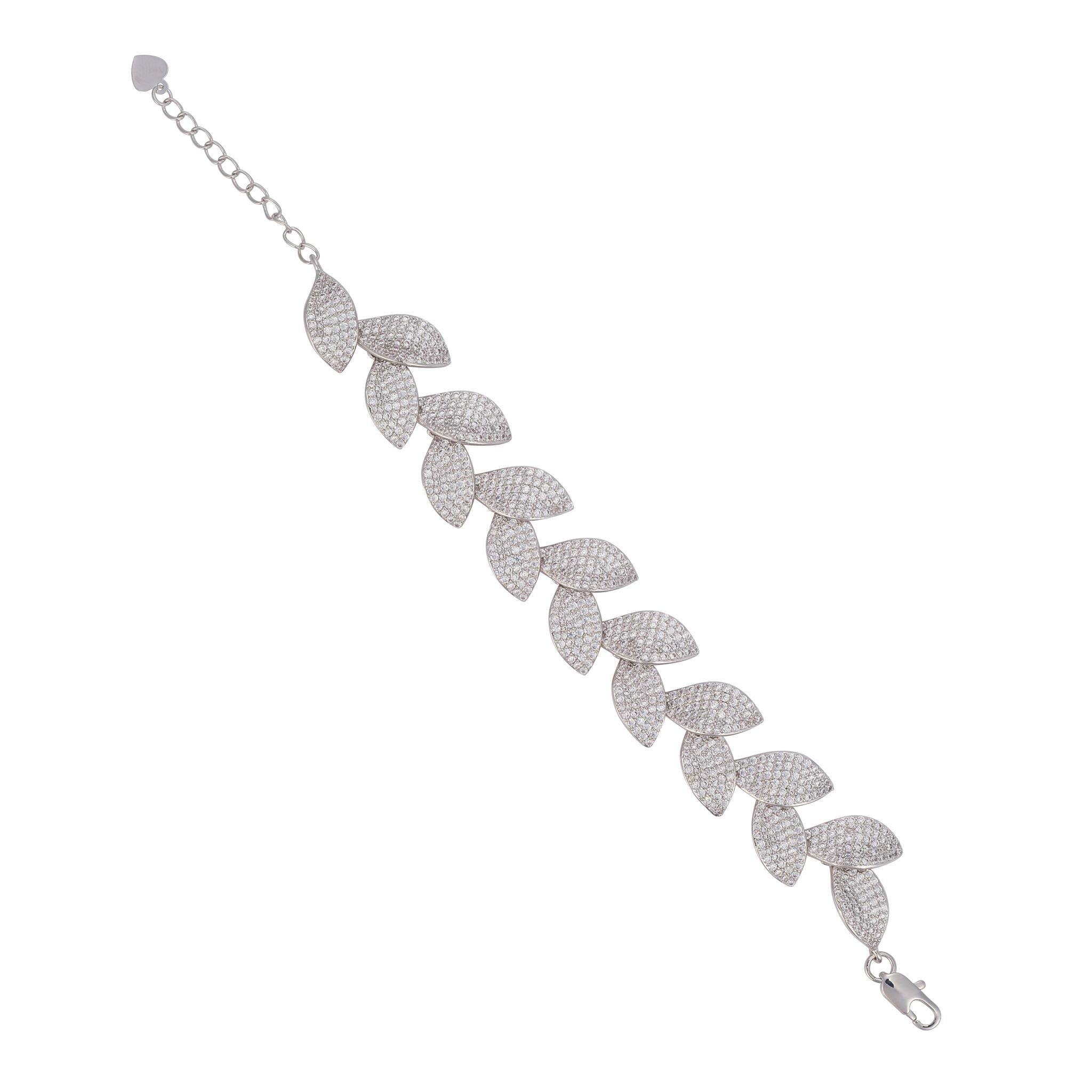 A white gold bracelet with leaf-shaped charms, set with cubic zirconia.