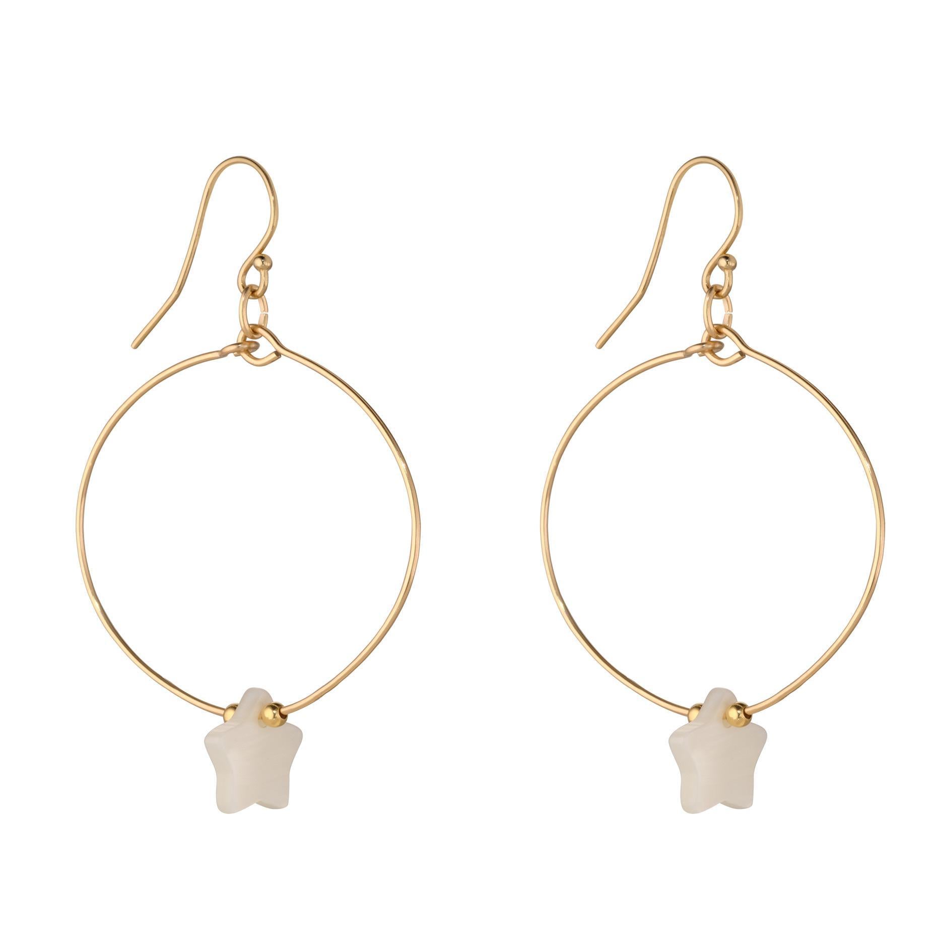 A pair of gold-filled hoop earrings featuring a freshwater shell star design.