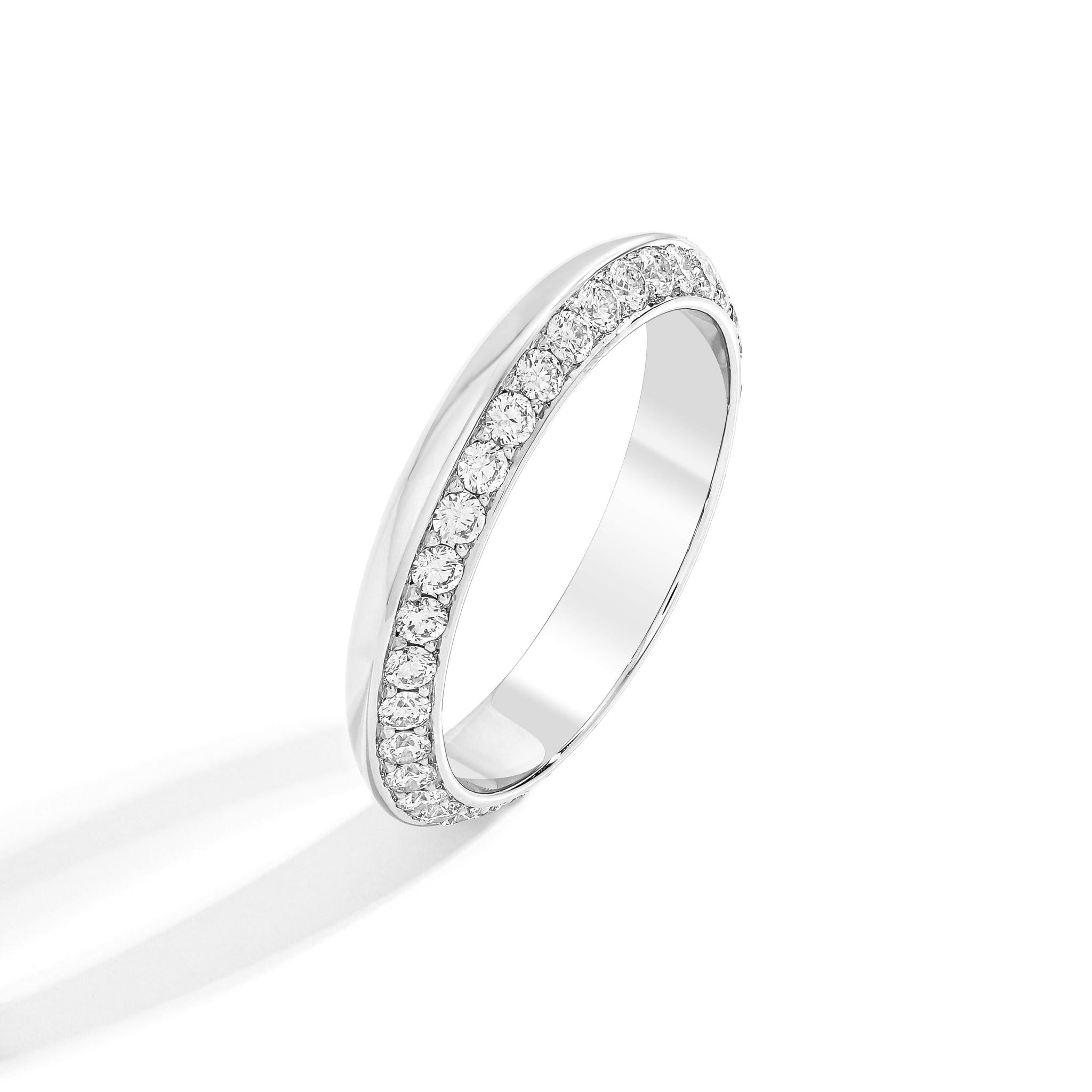 A platinum ring with diamond accents, designed and hallmarked in Dublin, Ireland.