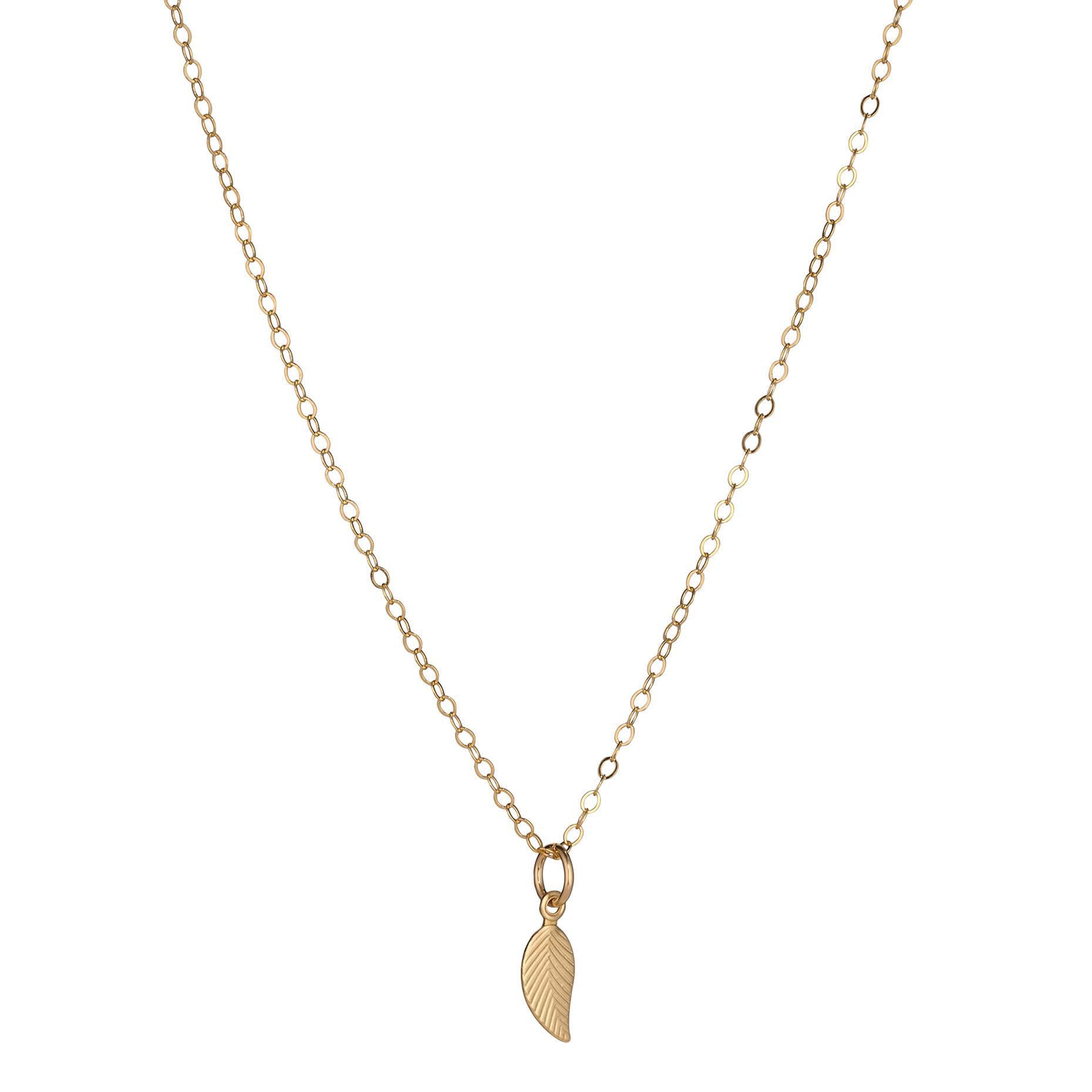 A gold-filled necklace featuring a leaf-shaped pendant on gold filled chain
