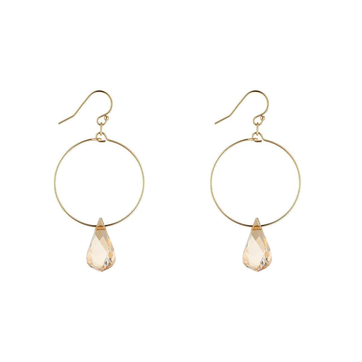 Gold filled hoop earrings with teardrop-shaped golden crystals