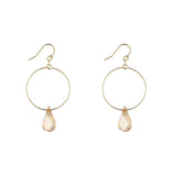 Gold filled hoop earrings with teardrop-shaped golden crystals