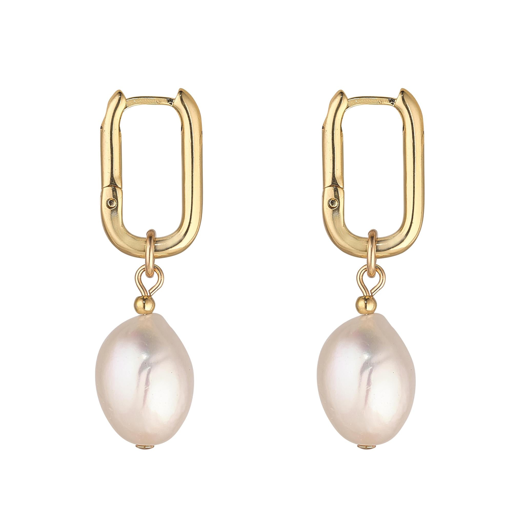 A pair of gold-filled clip hoop earrings with baroque pearls attached.