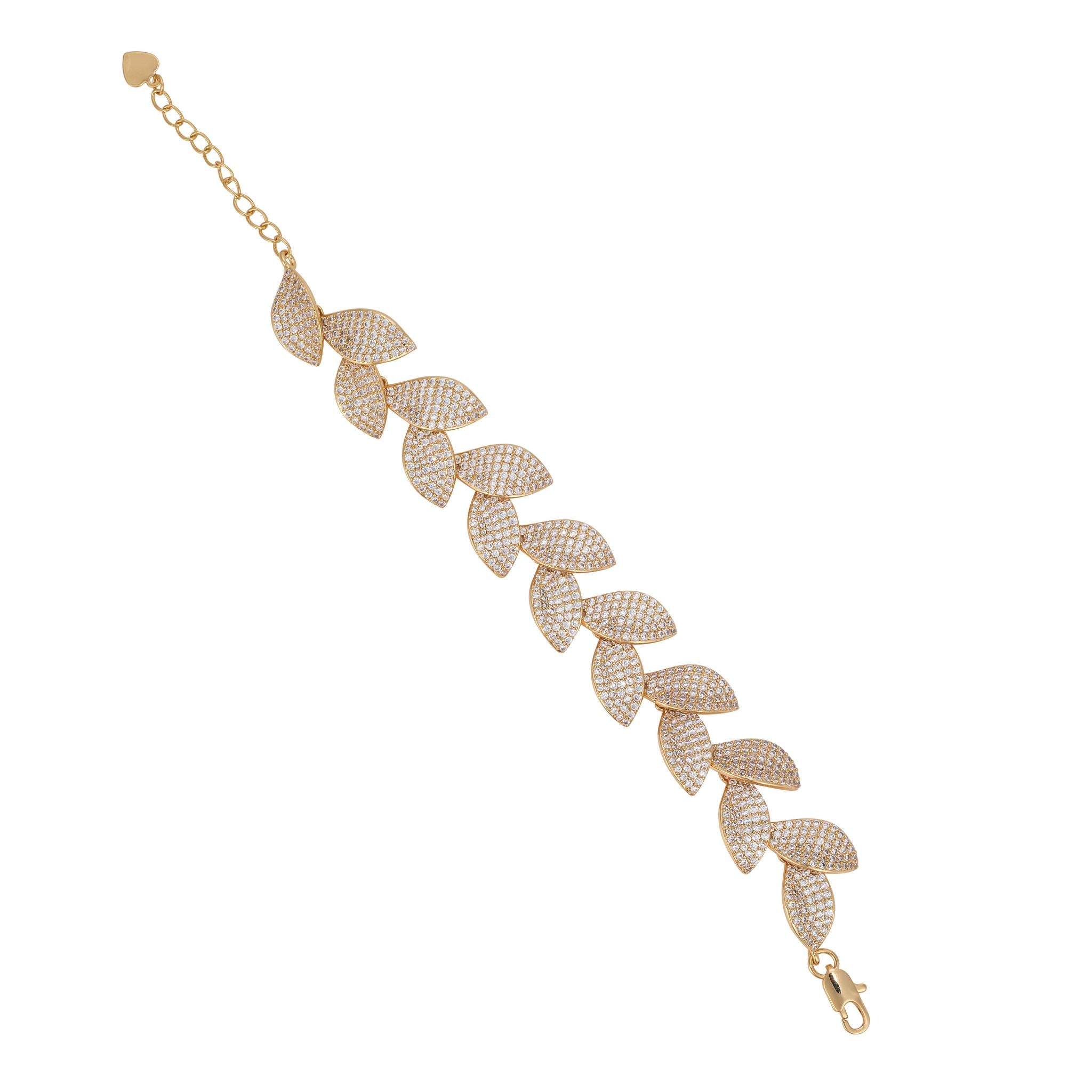 A gold bracelet with leaf-shaped charms, each set with cubic zirconia stones.