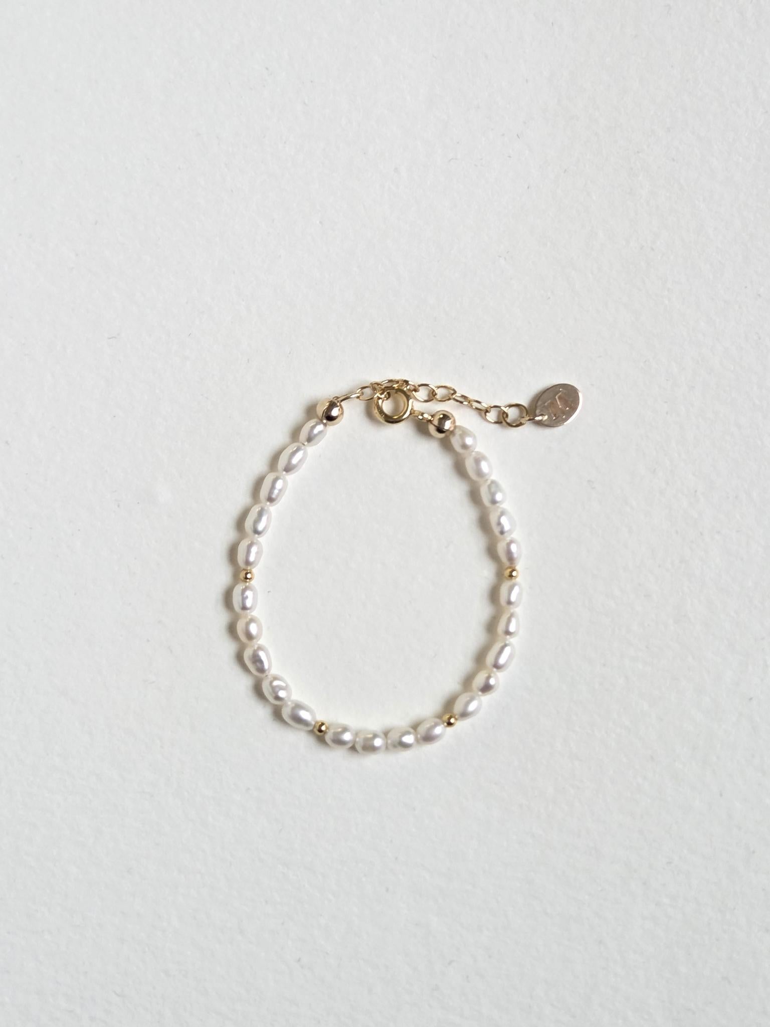 Childrens fresh water Pearl bracelet with gold filled clasp.