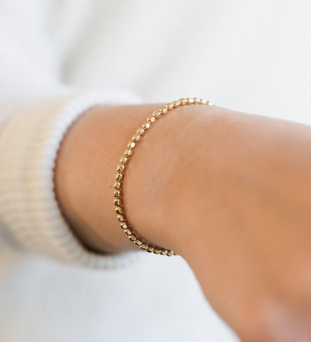 A gold filled square ball beaded bracelet 