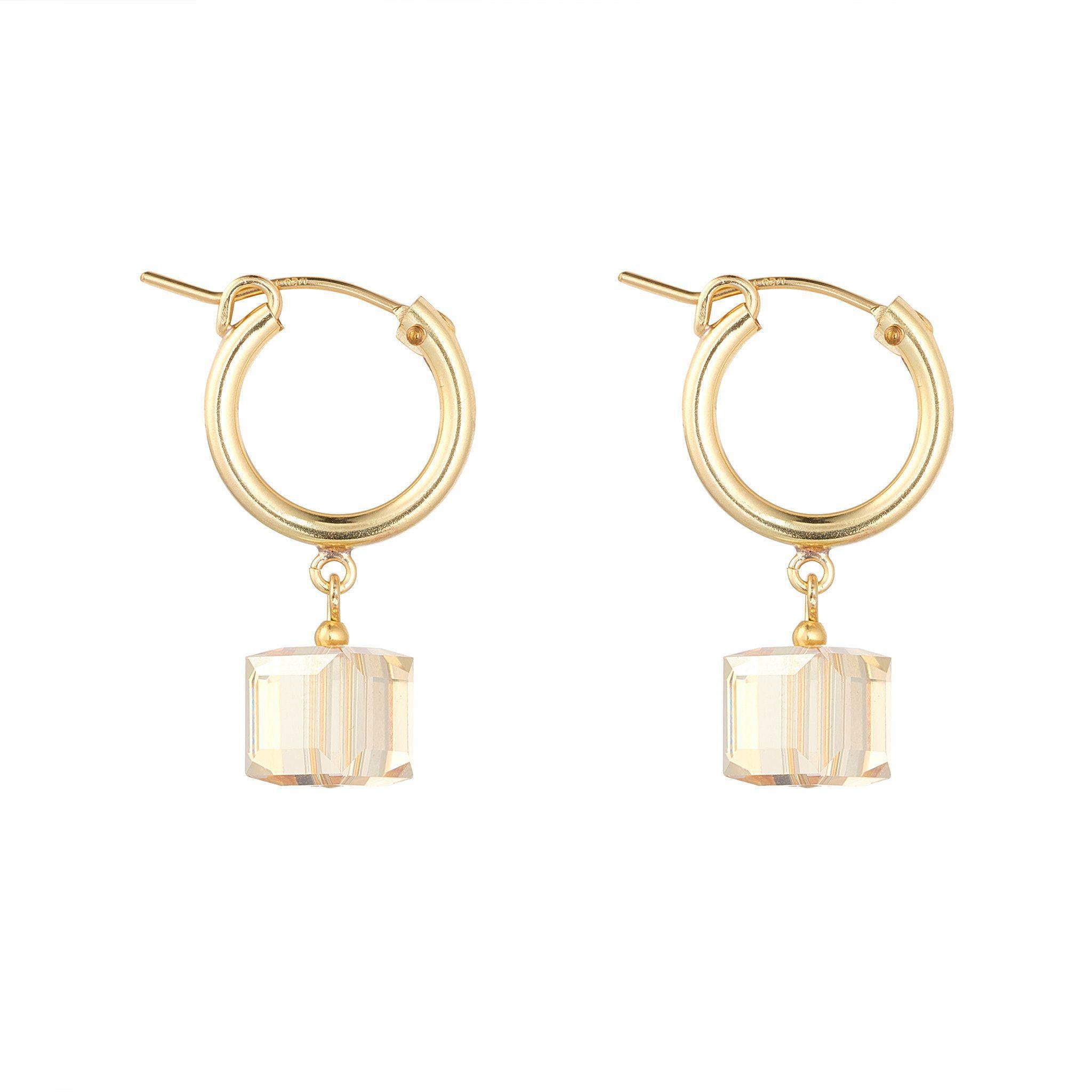A pair of gold filled clip hoop earrings with a golden shadow cube drop.