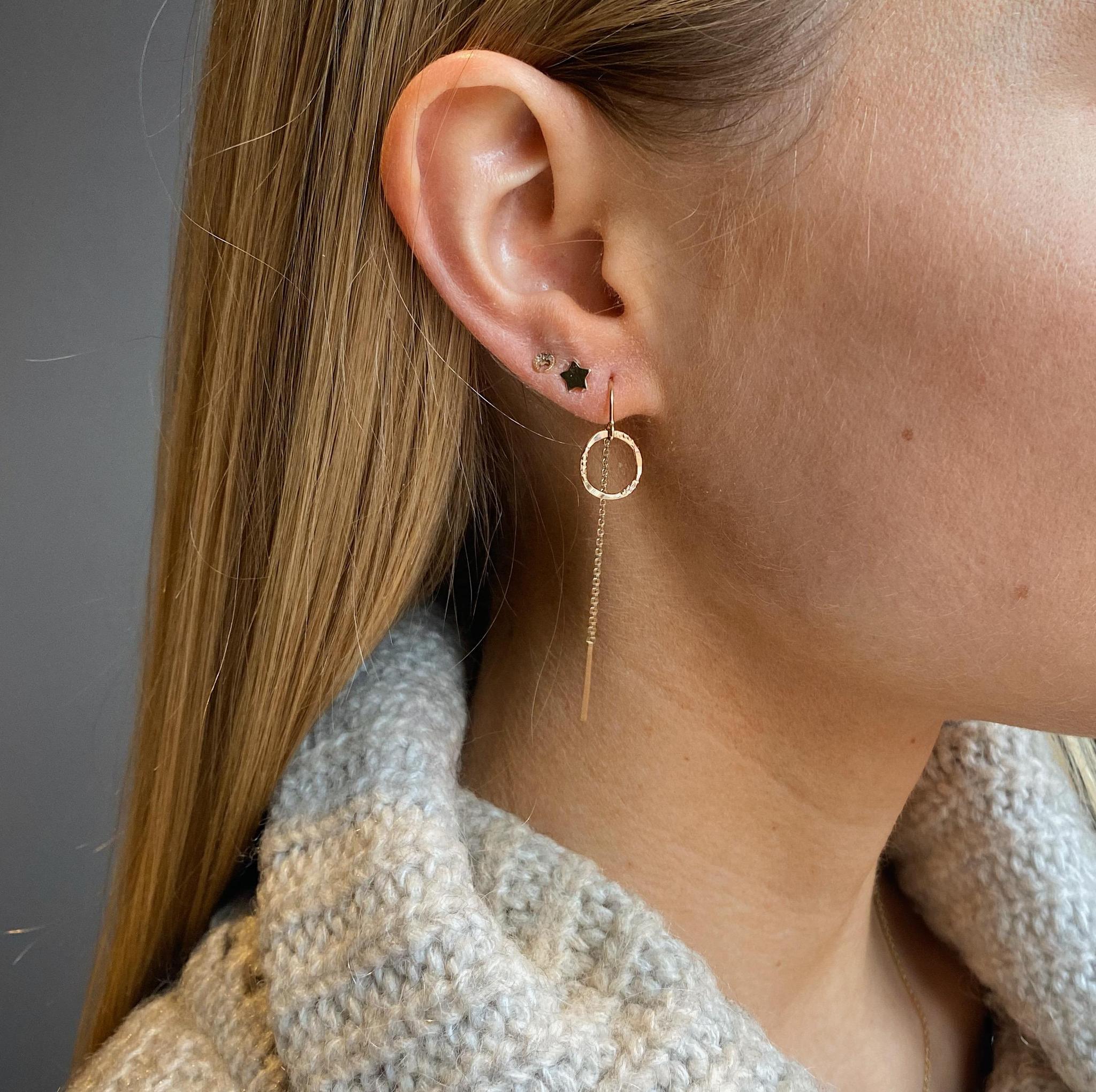 A pair gold-filled half threader earrings with small molten circle drop.