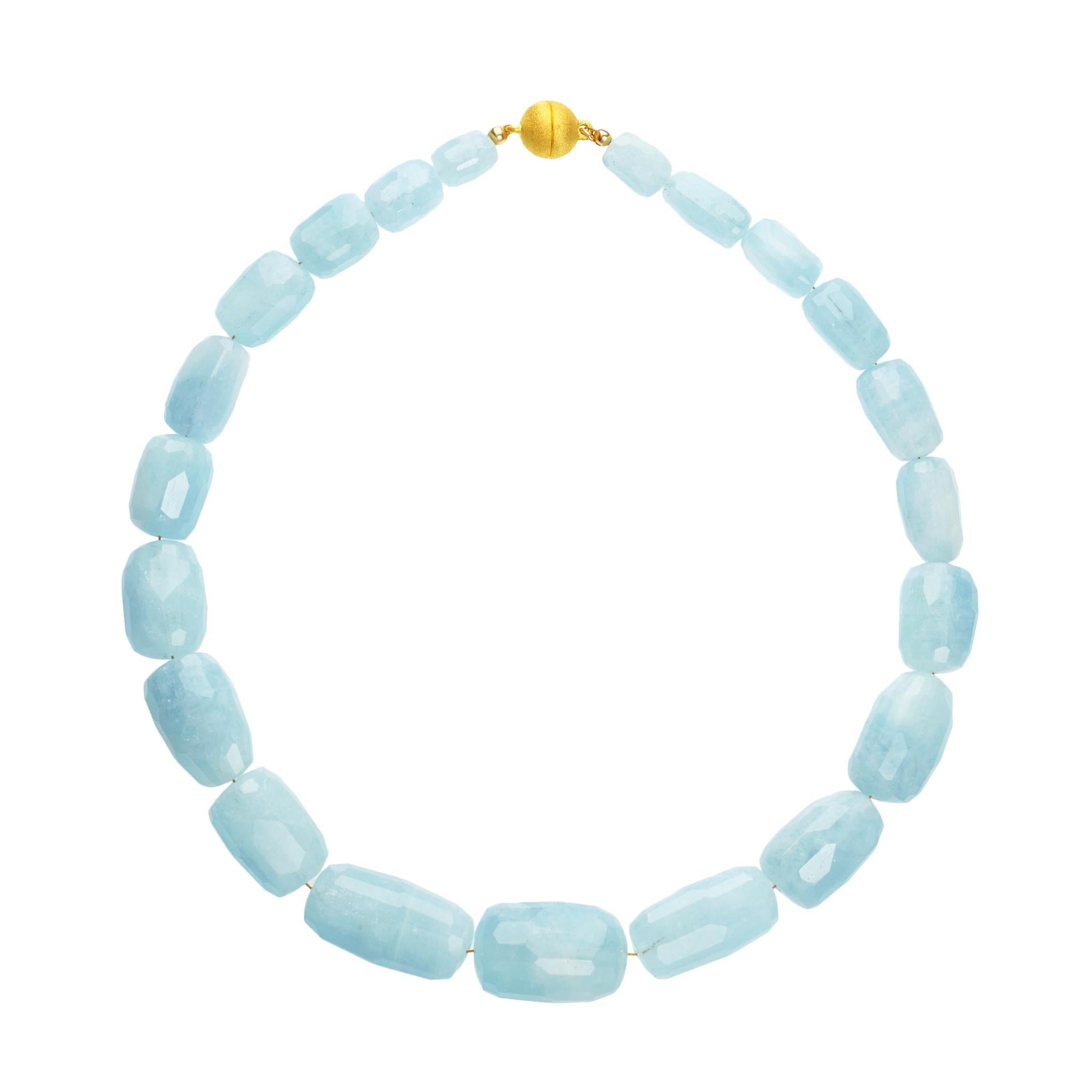 A Natural Aquamarine statement necklace with gold plated magnetic clasp.