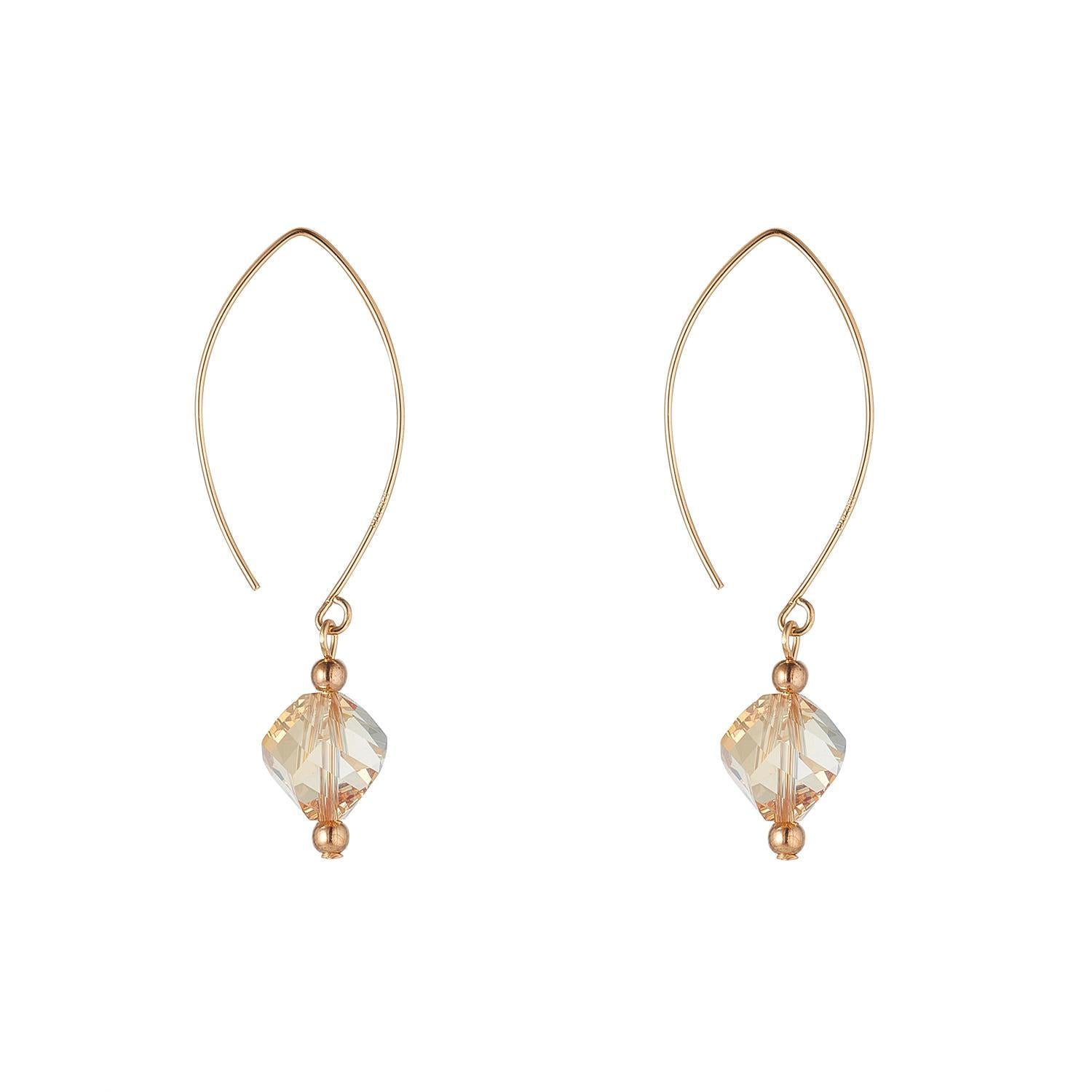 A pair of gold filled oval earrings with golden shadow diamond crystals.