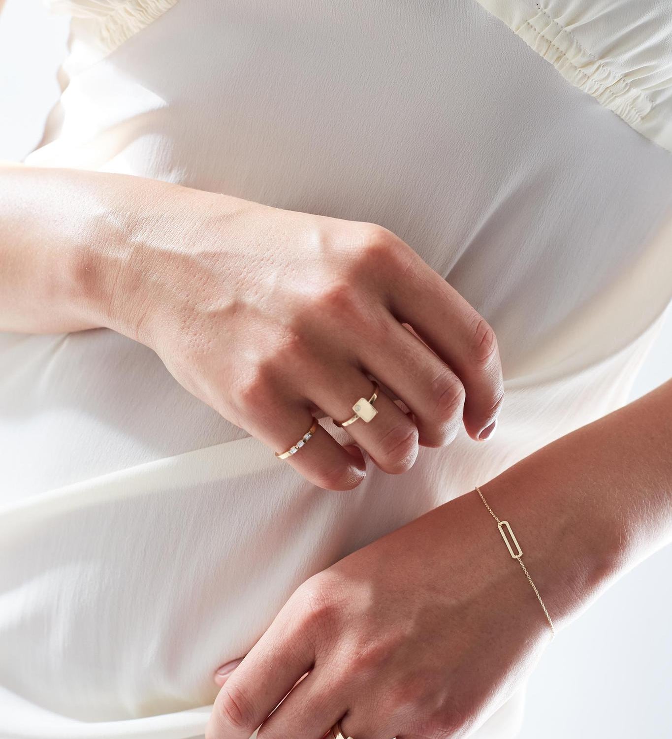 Tiny Diamond Tag Ring in 18kt Gold.