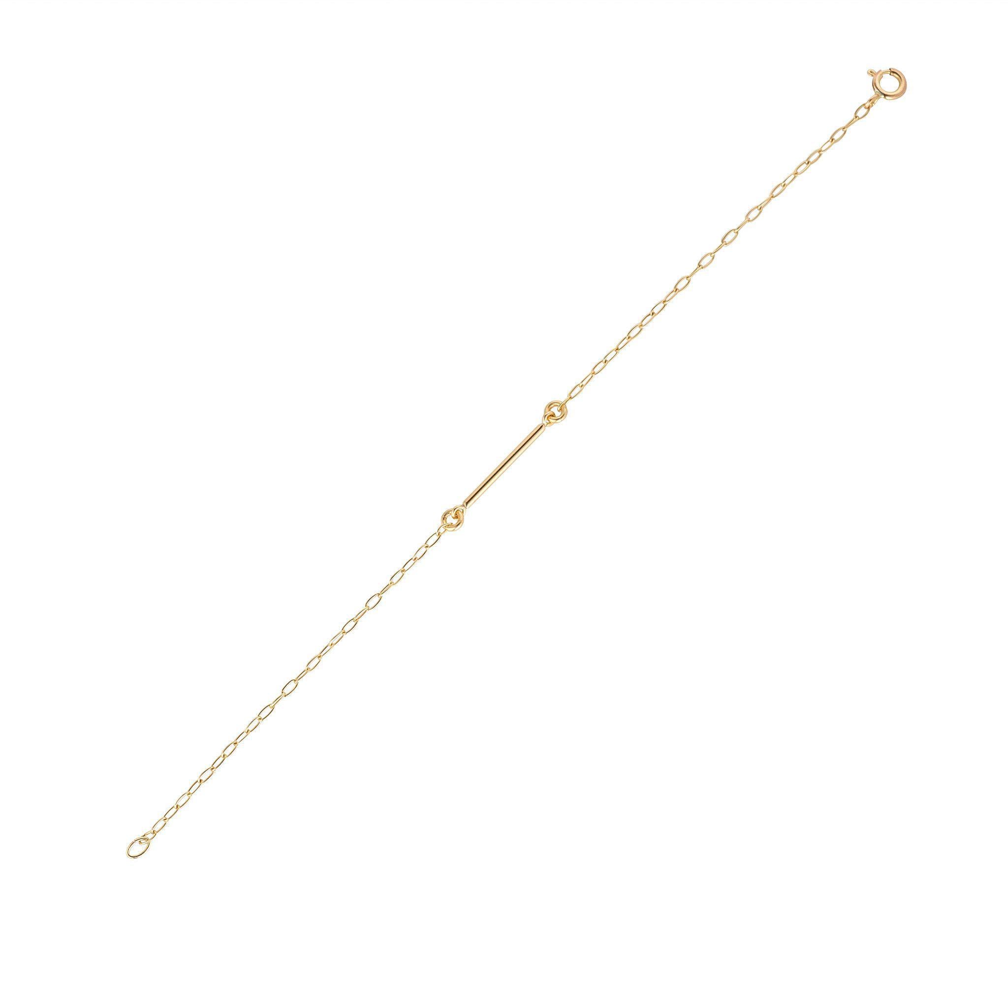 A gold filled bracelet with a horizontal bar and small beads on a chain, designed and hand-finished in Dublin.