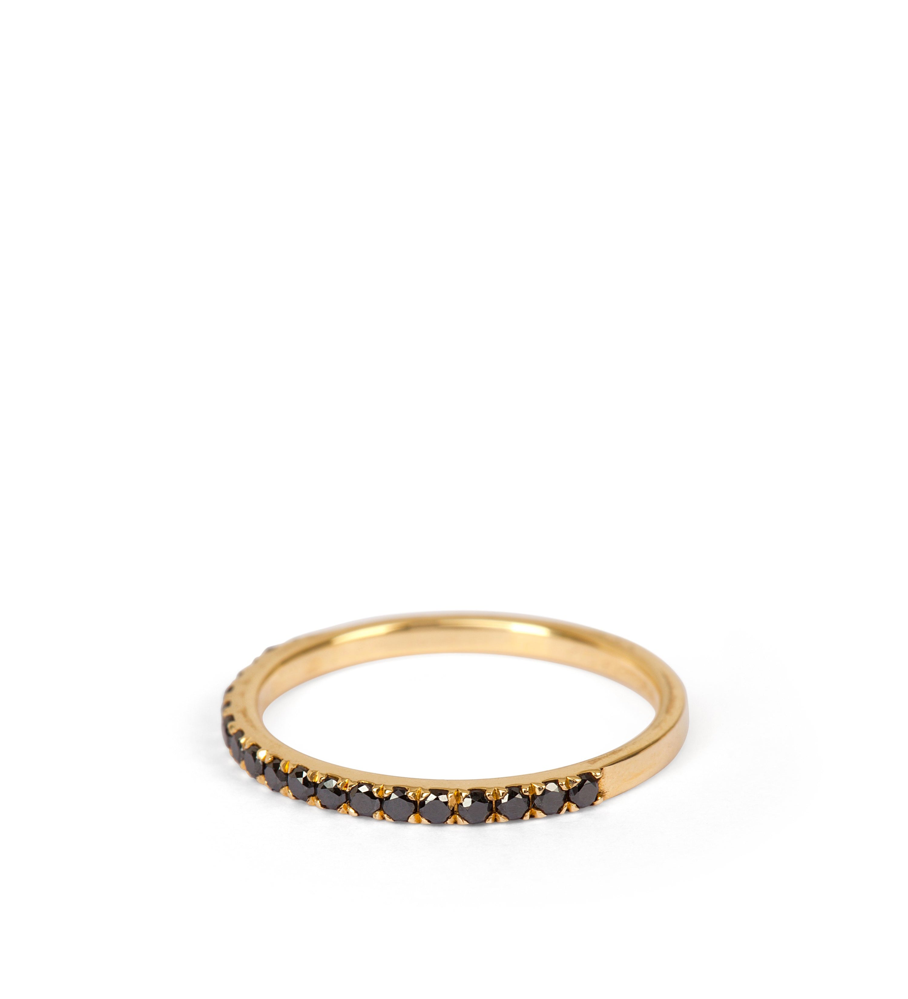 A dainty diamond half eternity ring in black, featuring a band with black natural diamonds