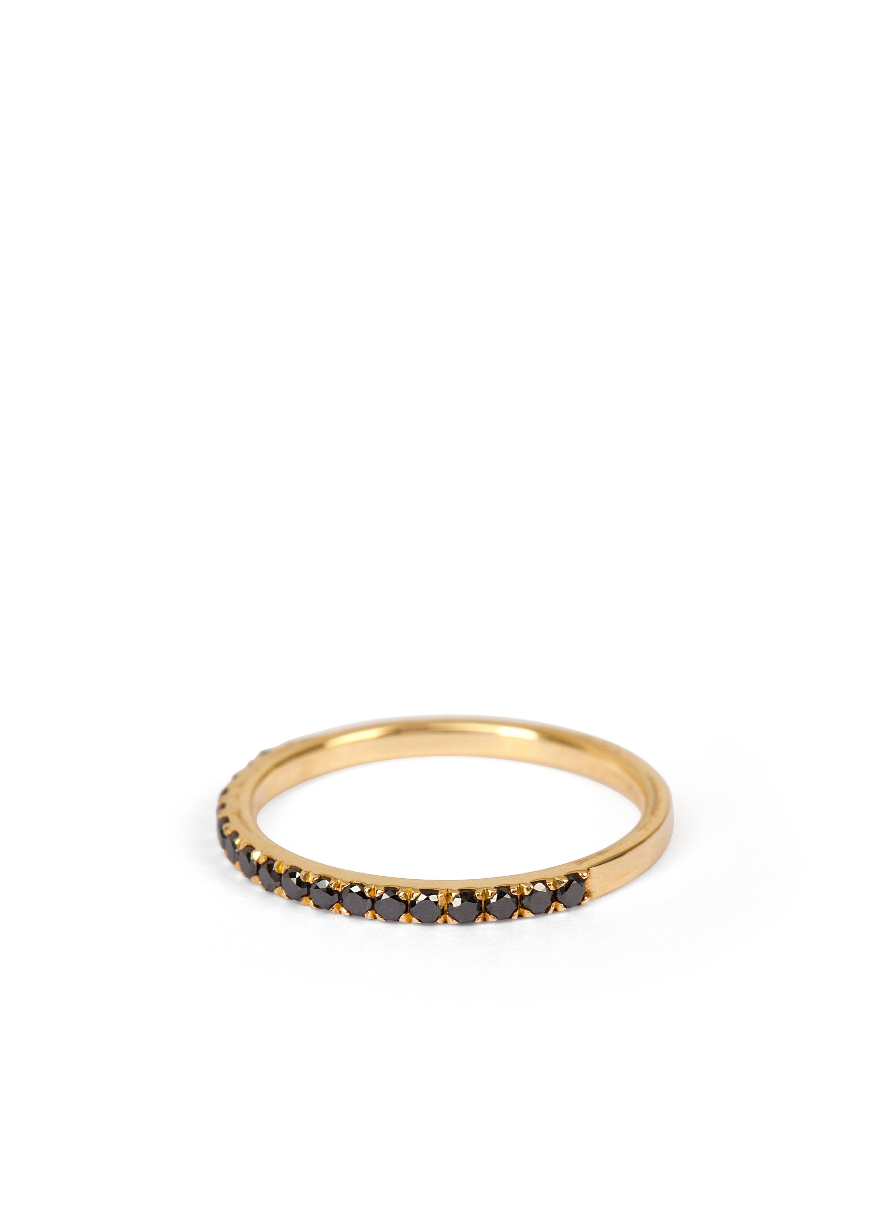 A dainty diamond half eternity ring in black, featuring a band with black natural diamonds